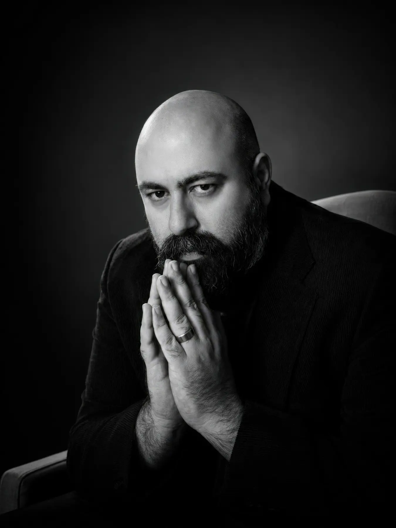Aidin Ardjomandi in a contemplative portrait as design critic